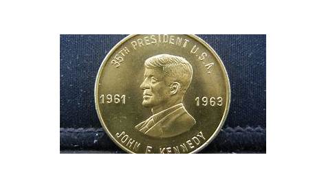 JFK Памятная монета: история и марка; ценность